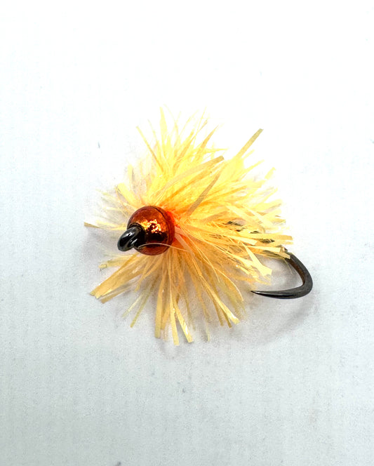 Apricot tungsten egg fishing lure on black barbless hook with orange-gold tinsel