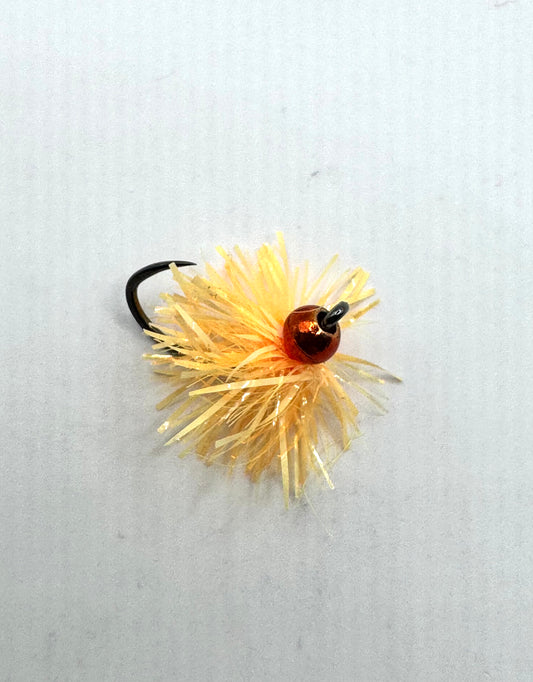 Apricot tungsten egg fishing lure with orange tinsel and black barbless hook