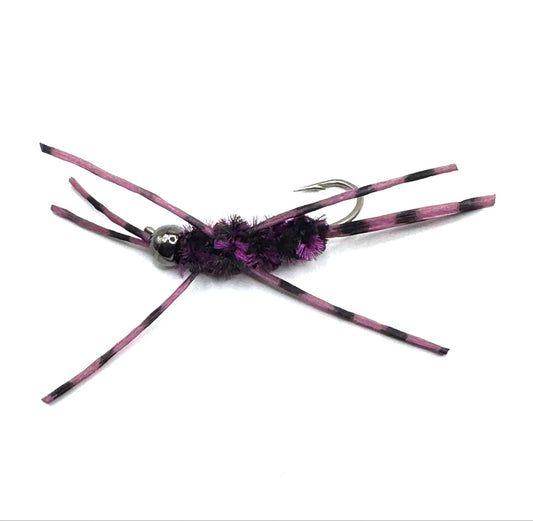 Size 12 fishing fly side view: fuchsia-striped legs, purple fuzzy thorax, barbed hook