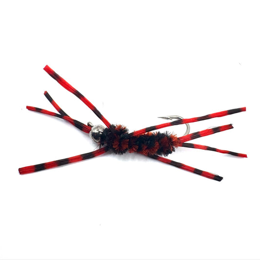 Red-and-black striped fly lure with fuzzy black body and silver hook rings
