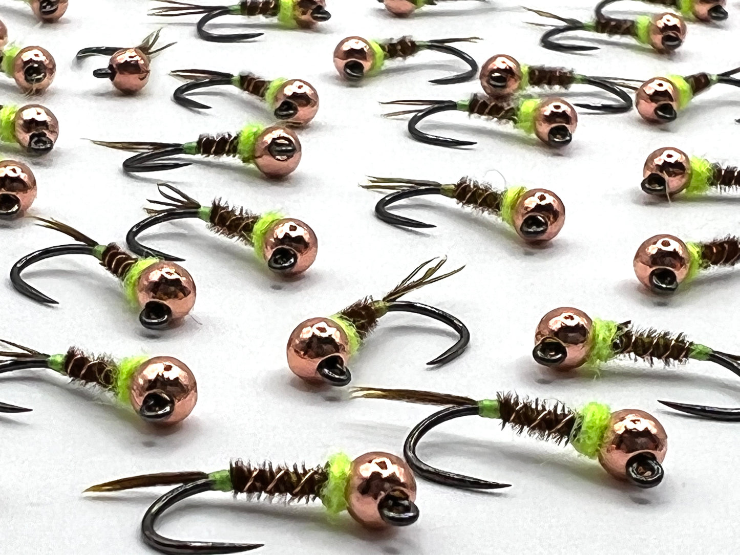 Assorted Size 14 Frenchie flies: copper beads, fluorescent green dubbing, black hooks