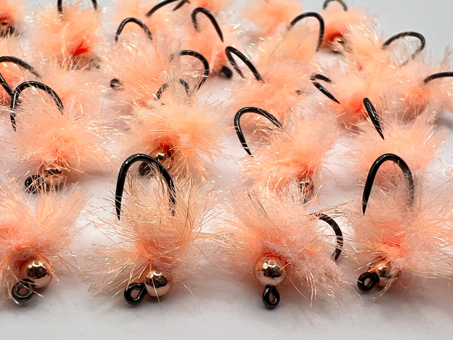 Orange prawn tungsten egg fly with barbless hooks, multiple strands