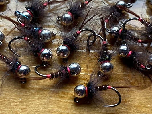 Size 12 black CDC nymphs with silver bead heads and black feather bodies