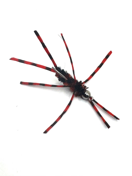 Stonefly lure, black and red striped legs, shiny metal bead, barbed hook