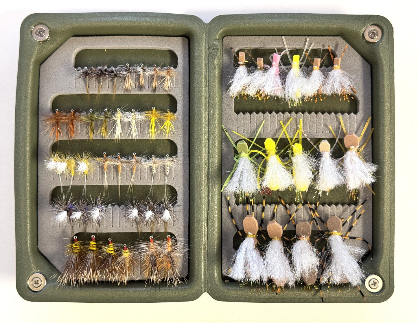 Dry Fly Box with open compartments holding assorted dry fishing flies