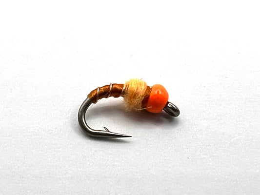 Orange midge fly with fluorescent orange bead, orange dubbing, curved barbed hook.