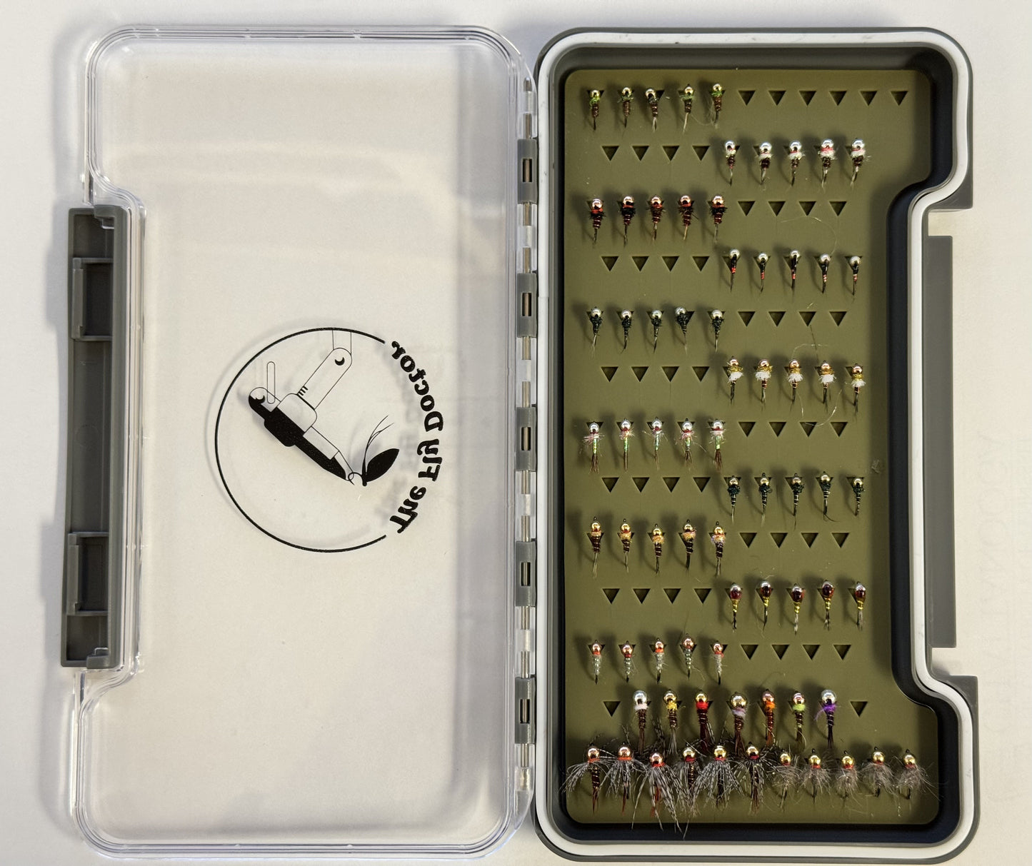 Large slim fly box with silicone insert, open lid showing organized fly hooks in rows