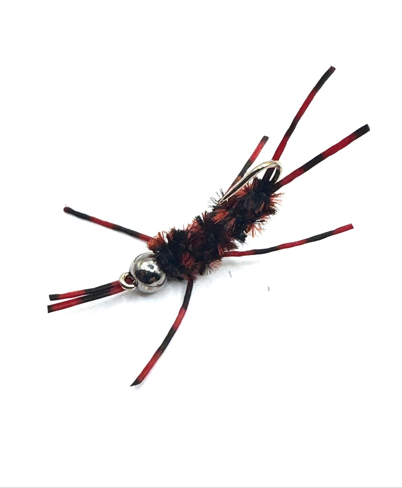 Red and black stonefly fishing lure, fuzzy segmented body, metal eye inserts