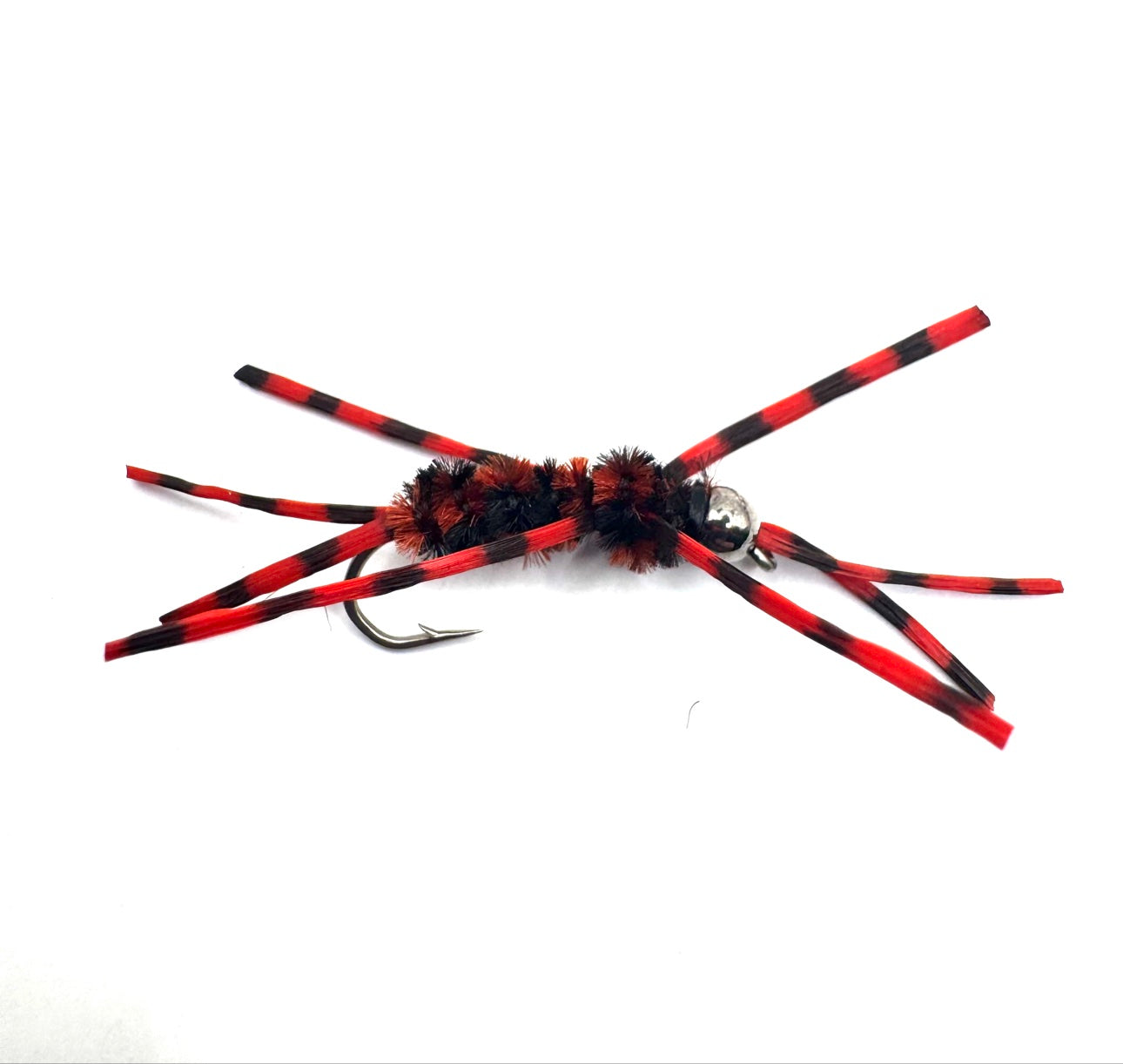 Red-and-black striped fly lure with fuzzy black body and silver hook