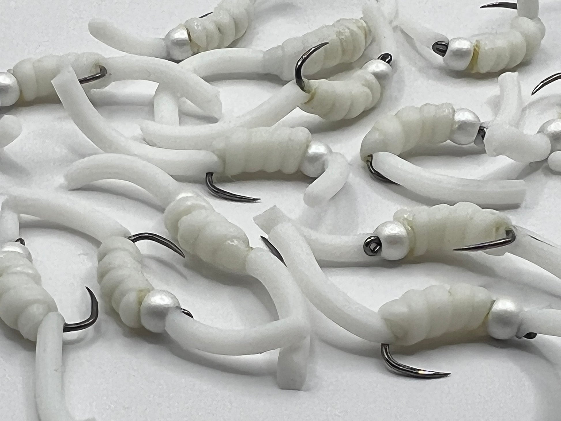 White squirmy worms